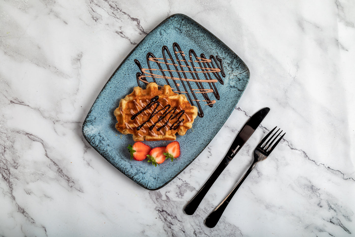 Protein Waffle with strawberry's and chocolate yogurt sauce Th1